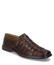 Der Halbschuh in marone besticht durch sein glattes Leder und einen praktischen Klettverschluss. Die seitlichen Aussparungen verleihen dem Schuh eine moderne Optik und sorgen für Luftzirkulation.