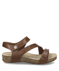 Die Sandale in der Farbe Camel verfügt über einen bequemen Klettverschluss und besteht aus hochwertigem Material. Sie zeichnet sich durch eine natürliche Korksohle und ein elegantes schlichtes Design aus.