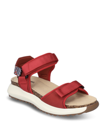Red sandal with Velcro closuremade from durable material. The sole is white and ergonomically shapedfeaturing a comfortable footbed and a patterned heel strap for added support.
