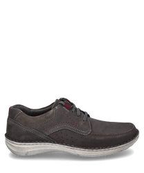 The half shoe in the granite combination color is made of robust material with a subtle lacing. It features contrasting red seams and a light gray sole.