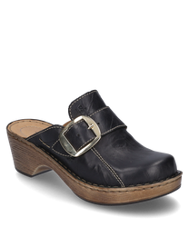 This black leather clog features a large buckle as a closure. The shoe has a sturdy wooden sole with a visible light brown seam giving the design a rustic charm.