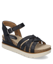 Sandale noire avec fermeture velcro réglabledessus en cuir. La sandale a une semelle beige en liège et en caoutchoucoffrant un confort supplémentaire. Idéale pour l'été et les tenues décontractées.