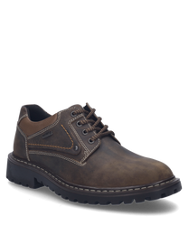 La chaussure basse de couleur Brésil est en cuir robuste et dotée de coutures contrastantes. La chaussure dispose d'un laçage et d'une semelle profilée pour un maintien optimal.