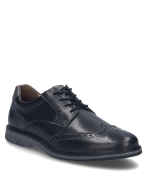 Elegante halfhoge schoen van zwart leer met veters. De schoen valt op door fijne brogue-details en een robuuste zool die comfort en stijl verenigt.