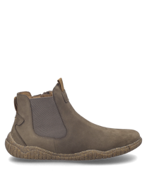 De taupe kleurige enkellaars van zacht materiaal heeft een zijrits en elastische inzetten voor extra comfort. De robuuste zool biedt betrouwbare grip en rondt het elegante ontwerp af.