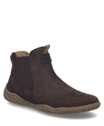 Die Stiefelette in der Farbe Brasil besteht aus einem weichen braunen Wildledermaterial mit elastischen Einsätzen an den Seiten. Sie verfügt über einen praktischen Reißverschluss für einfaches An- und Ausziehen.