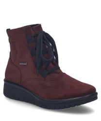 The burgundy half shoe is made of a soft material and features an elegant lacing. The shoe has a sturdy black sole that provides additional comfort.