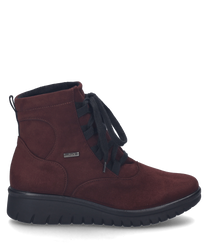 The burgundy half shoe is made of a soft material and features an elegant lacing. The shoe has a sturdy black sole that provides additional comfort.