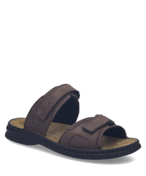 Sandalias de cuero marrón con cierre de velcro. Suela negra de goma y diseño ergonómico para mayor comodidad.