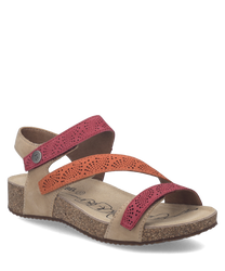 These sandals feature a beige leather base with vibrant red and orange Velcro straps. The cork sole adds a natural touch and provides comfort for everyday wear.
