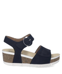 Sandalo nero con chiusura in velcro e fibbia rotonda. Suola in sughero con piattaforma bianca per un look casual e moderno.