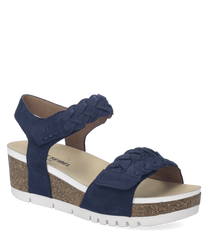Sandales en cuir bleu avec fermeture Velcro. Semelle compensée en liège avec détails tressés élégants.