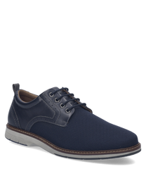 The shoe is a low-cut style with a navy blue leather and mesh upper. It features a lacing closure and a contrasting white and brown sole for a modern touch.