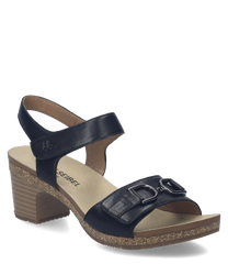 Sandales en cuir noir avec fermeture Velcro. Talon moyen et semelle intérieure beige confortable.