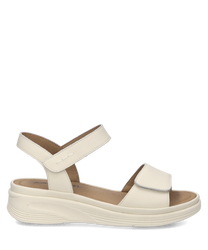 Sandales en cuir blanc avec fermeture Velcro. Semelle épaisse et confortable pour un soutien optimal.