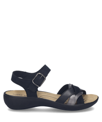 Sandales en cuir noir avec fermeture Velcro. Semelle intérieure beige et semelle extérieure noire offrant confort et élégance.