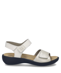 Sandalo elegante con chiusura in velcro Realizzato in pelle bianca con dettagli metallici su una suola nera Offre comfort e stile per ogni occasione estiva