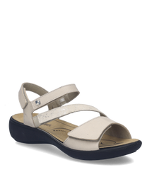 Sandales en cuir beige avec fermeture Velcro. Semelle noire pour un confort optimal.
