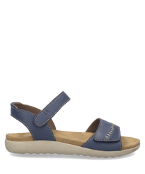 Sandales bleues en cuir avec fermeture Velcro. Semelle beige et intérieur doux pour un confort optimal.