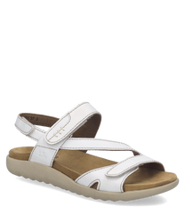 Sandalo bianco in pelle con chiusura in velcro. Suola beige confortevole e design elegante per un look casual.