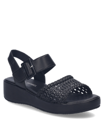 Elegante schwarze Sandale aus Leder mit praktischem Klettverschluss. Der geflochtene Riemen verleiht einen stilvollen Akzent und sorgt für zusätzlichen Halt.