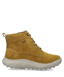 Gelbe Stiefelette aus Wildleder mit Reißverschluss. Robuste weiße Sohle mit Profil für besten Halt.