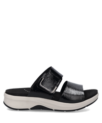 Schwarze Sandale mit Klettverschluss und glänzender Oberfläche. Weiße Sohle für hohen Komfort und modischen Look.