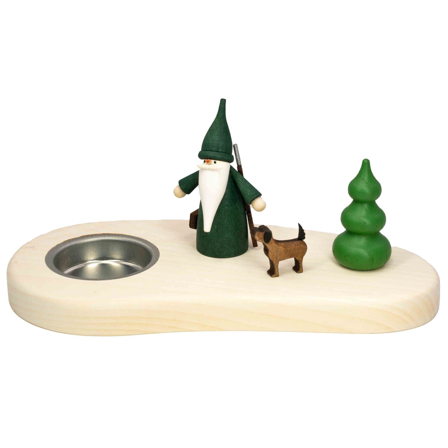 Ein moderner Teelichthalter aus Holz zeigt einen Jägerwichtel mit grünem Gewand und Gewehr sowie einen Hund und eine grüne Tanne