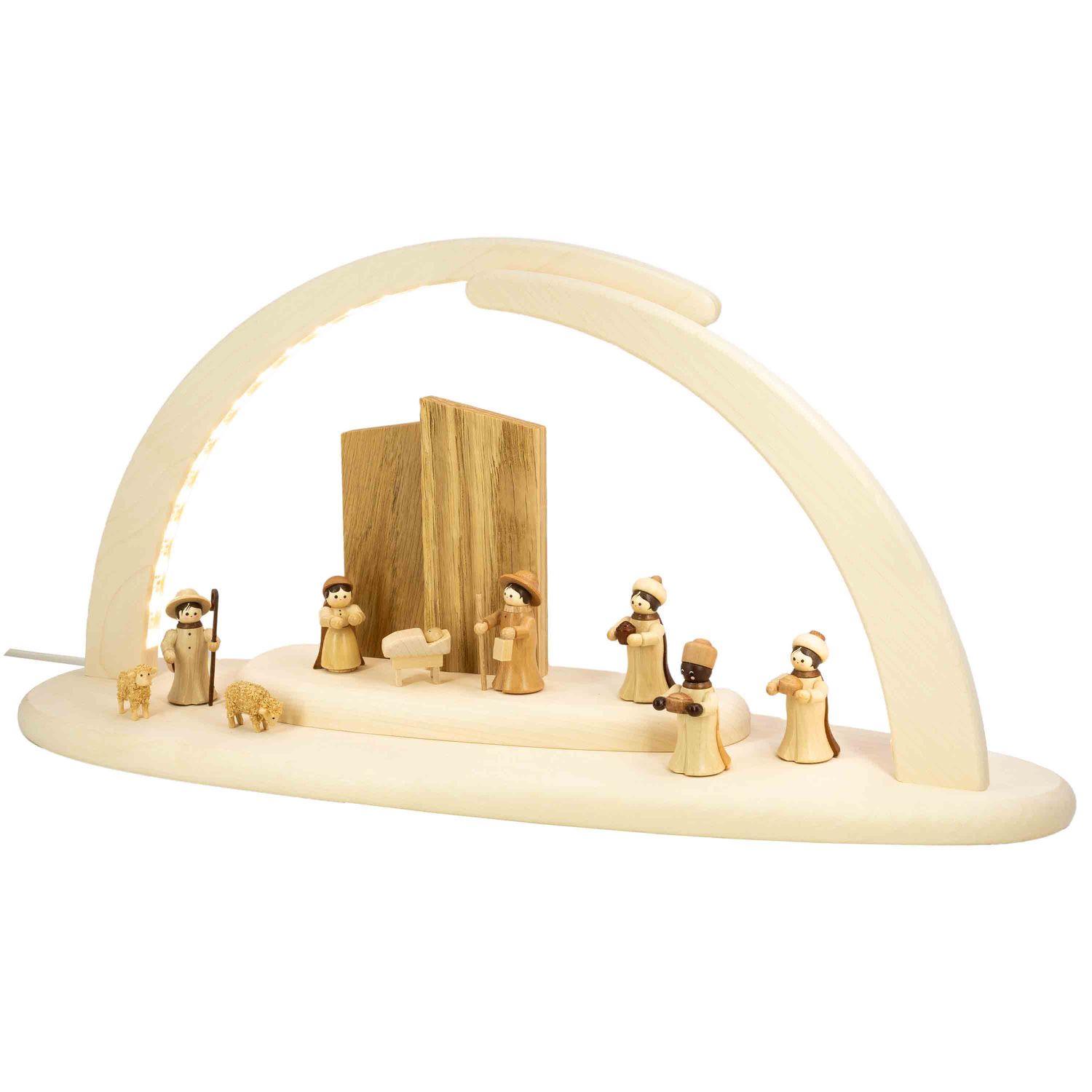 Ein moderner Lichterbogen zeigt eine Krippe mit der heiligen Familie sowie Hirten mit Schafen und den drei Weisen