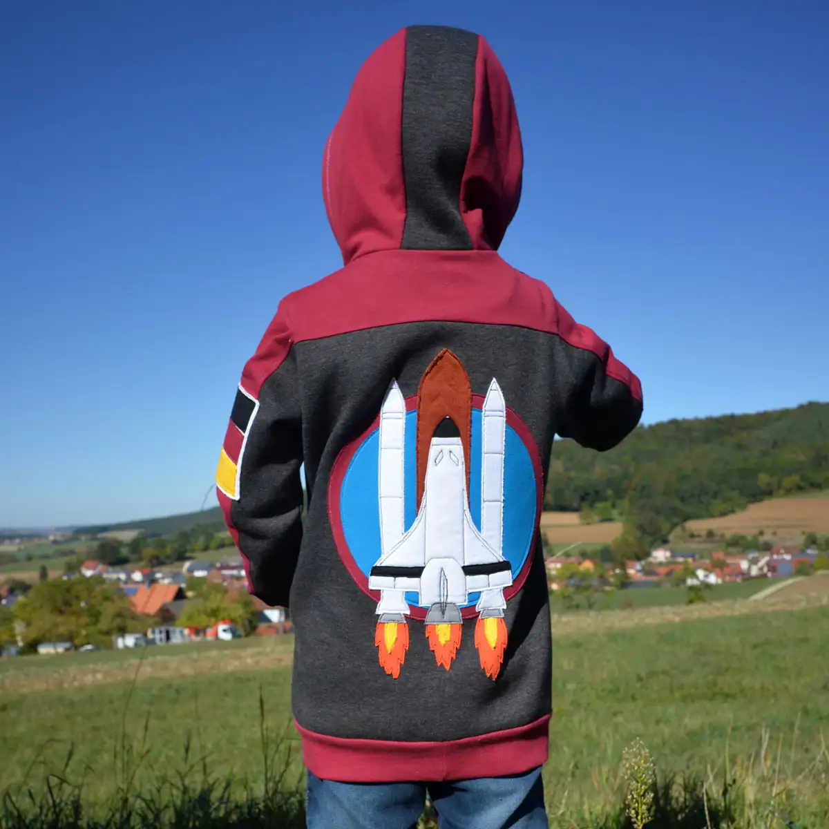 Raketen-Applikation aus Jerseystoff-Resten