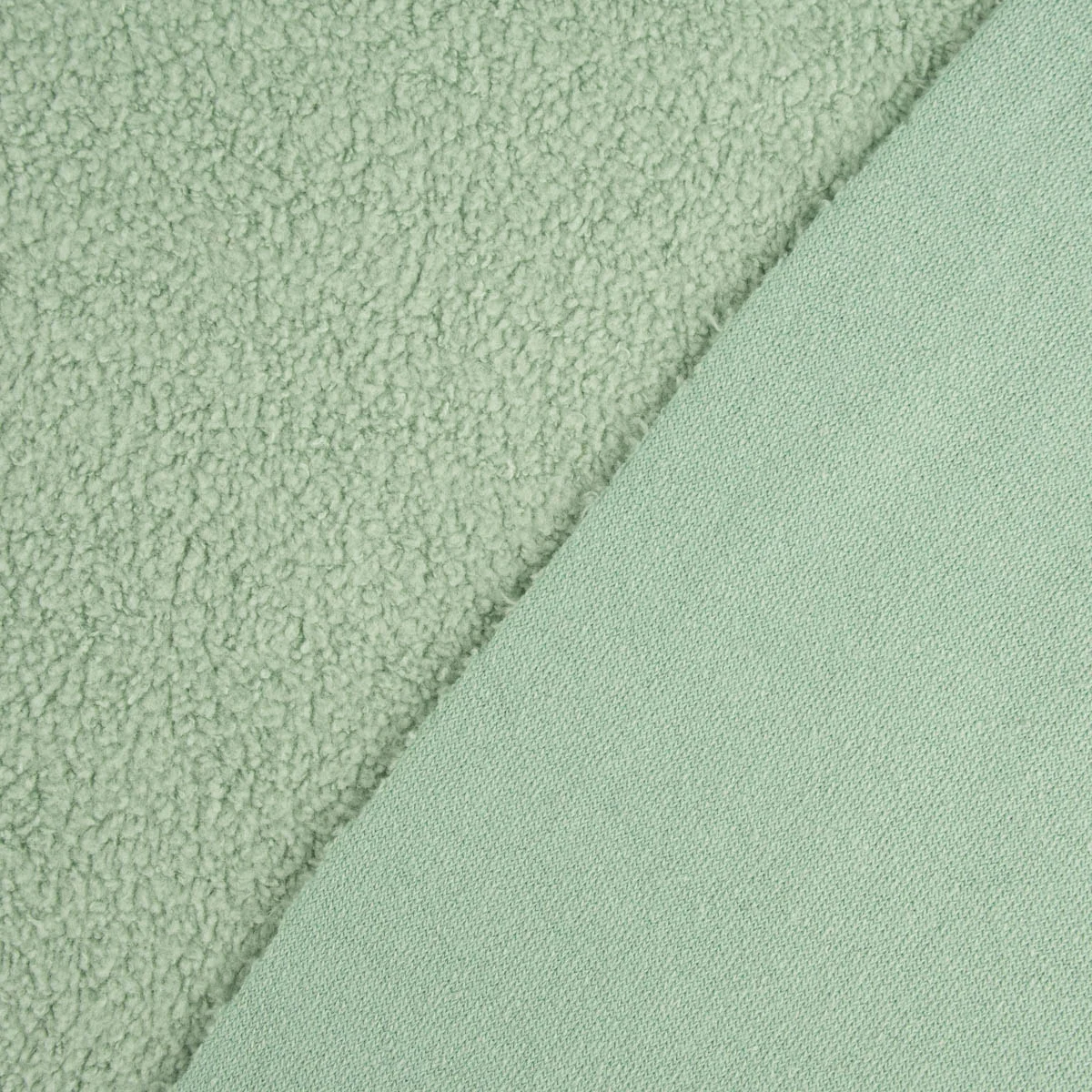 Detailaufnahme Sweatstoff Sherpa Fleece mit aufgerauter Oberfläche