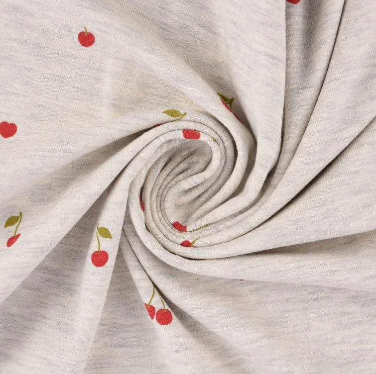 Jerseystoff mit KIrschen und Herzchen