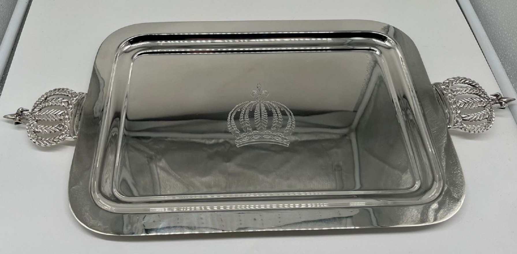 Luxurious serving tray made of nickel-plated brass, decorated with wide crown handles, from the Harald Glööckler POMPÖÖS PROVENCE collection 2024 by Casa Padrino.