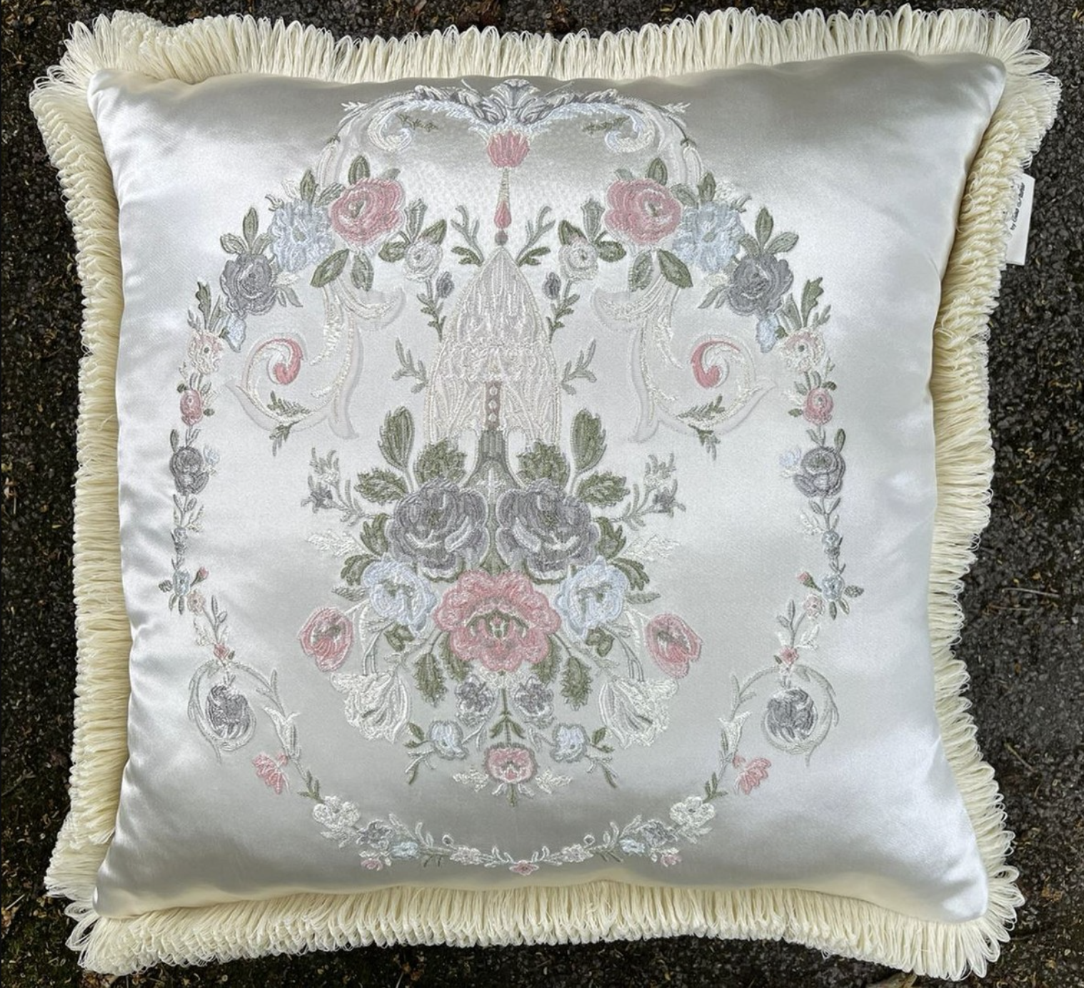 Handmade cushion in white with a colorful floral pattern made of velvet fabric from the Pompöös Provence collection by Harald Glööckler. Luxurious design with detailed floral patterns. Perfect for giving any room an elegant and blooming atmosphere.