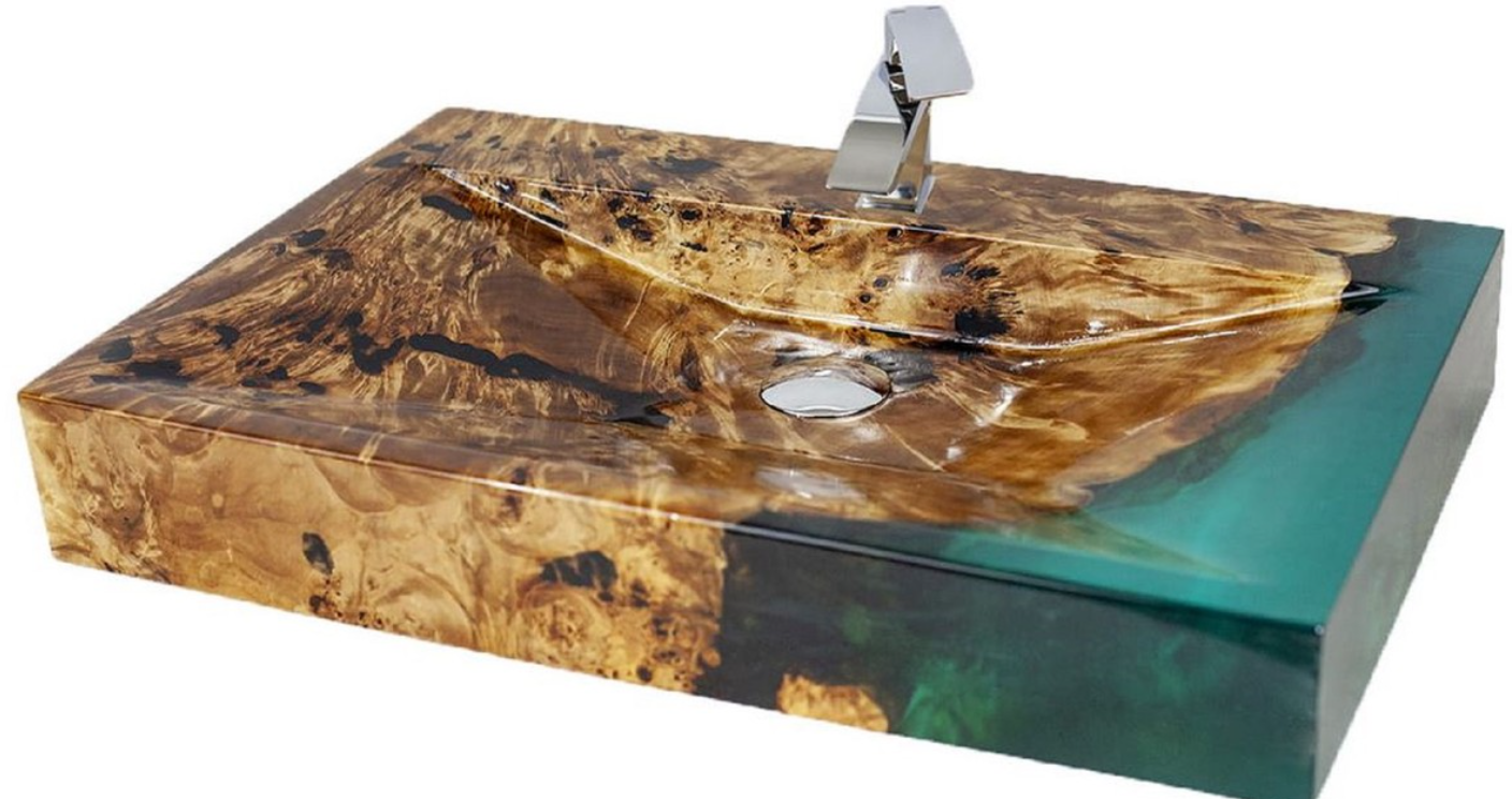 Un lavabo noble en bois massif raffiné avec de la résine époxy par Casa Padrino