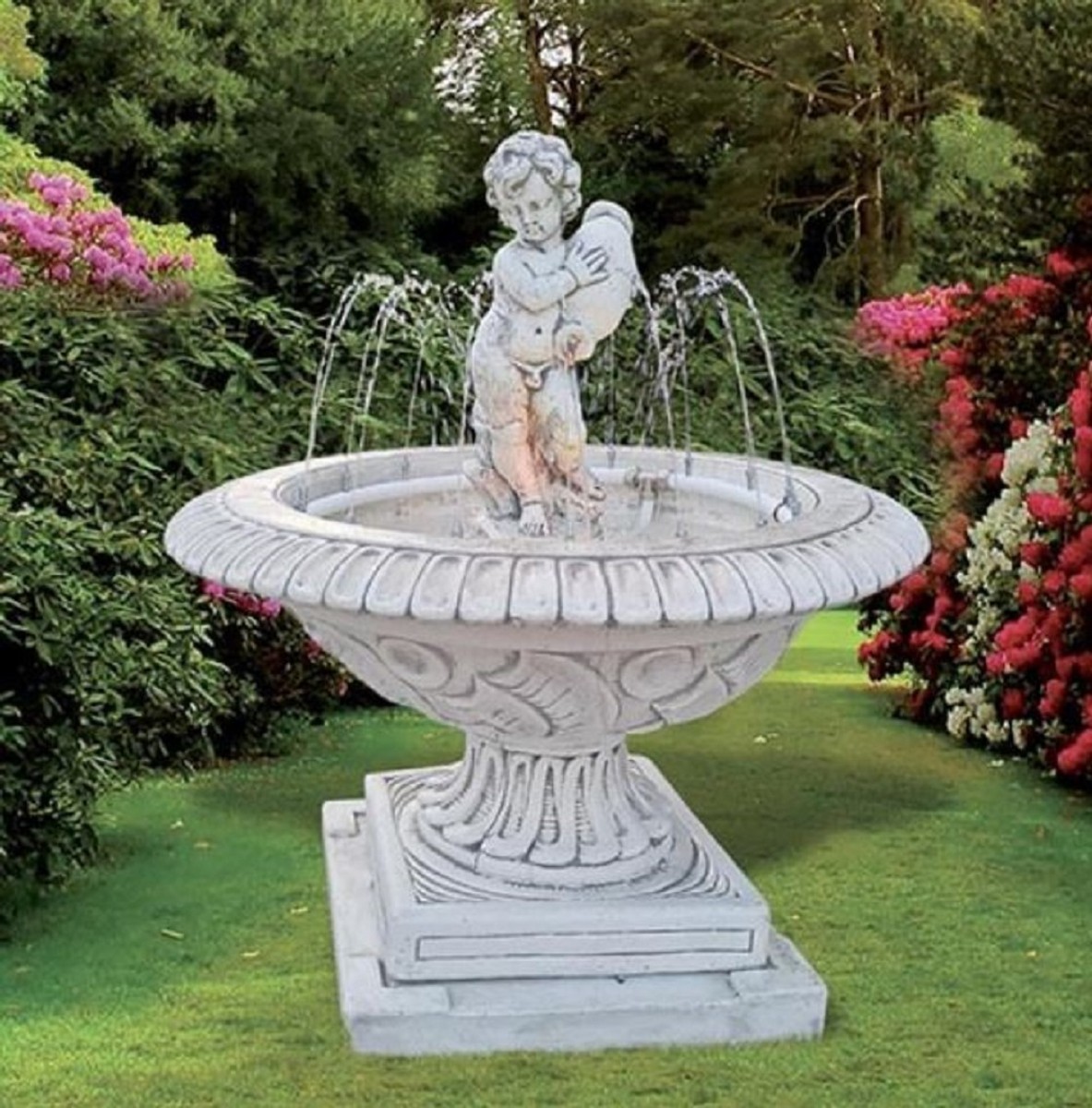 You see a round fountain with side fountains and in the middle a figure holding a vase.