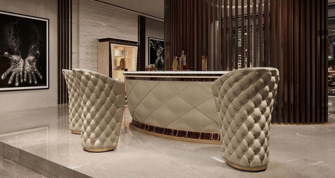 Luxurious hotel lobby bar with exclusive bar stools in gold cream white by Casa Padrino.