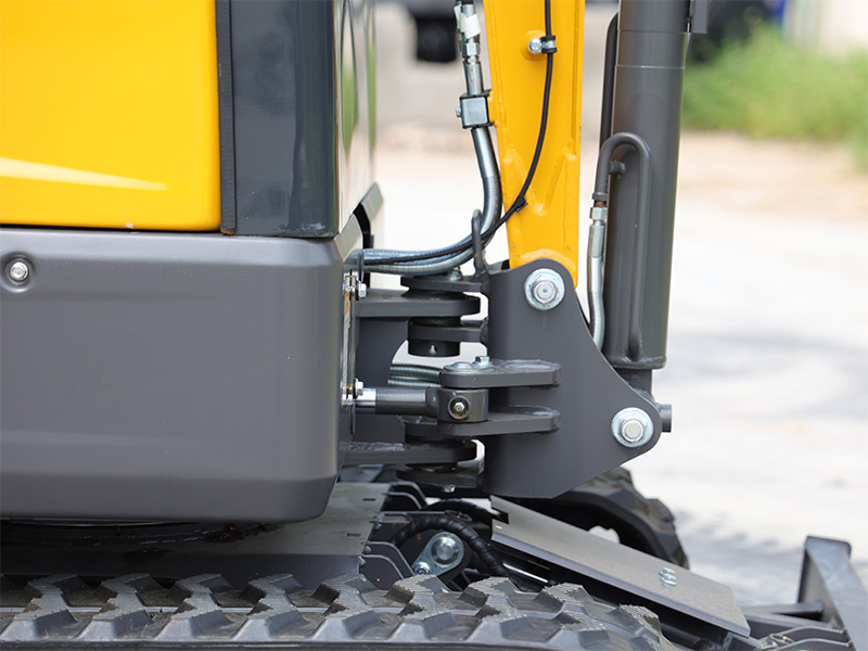 Verbindung Baggerarm und Maschinenkörper