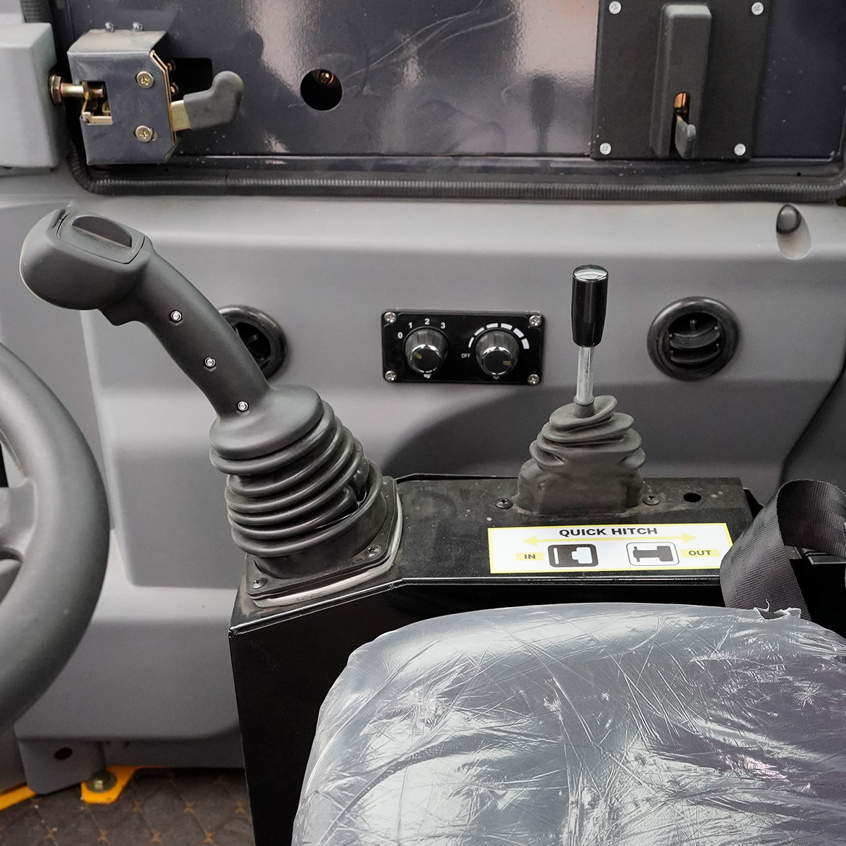 Joystick und Schnellwechsler Hebel